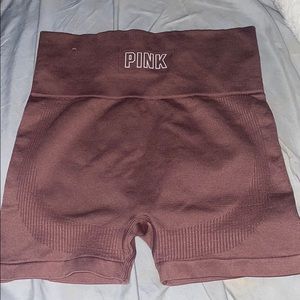 Pink shorts, booty lifting spanks